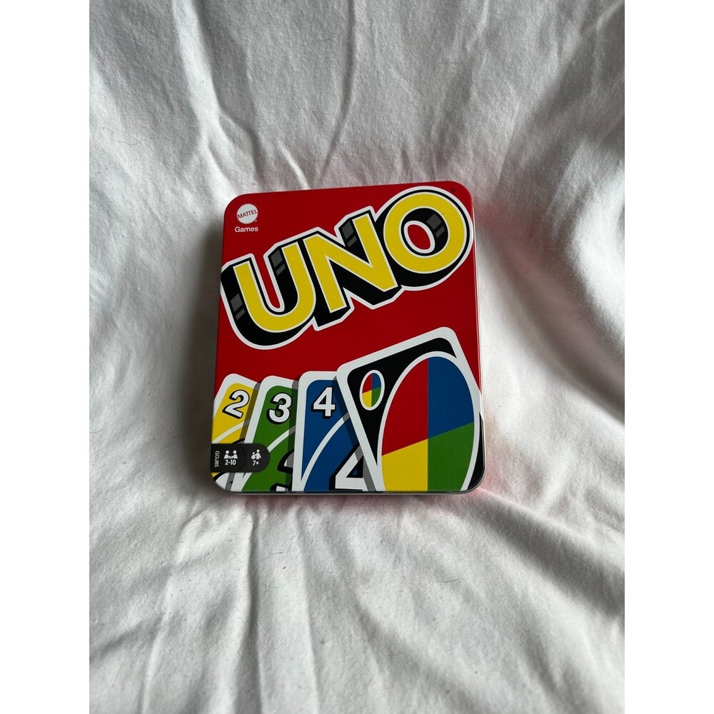 Mattel Games UNO Card Game in a Collectible Storage Tin for Kids, Adults,...